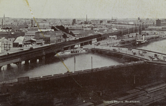 Sandridge Railway Bridge and Yarra Turning Basin with the Falls Bridge (later Queens Bridge) in the foreground, circa 1920