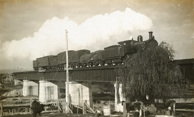 A steam locomotive crossing the Tambo River Bridge on the Bairnsdale to Orbost line, Bairnsdale, 1914