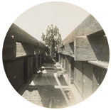 A group of workers pose on the girders of the bridge over Emu Creek on the Gheringhap to Maroona line. Erection of girders, 1912