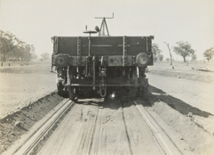 Construction of line, Yarrawonga, circa 1927-33. Ballast has been spread between the tracks by the plough while excess ballast has been deposited on the outside of the tracks.