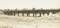 An open deck bridge (with sleepers laid directly over steel girders) replacing a culvert at the scene of a washway, Yarrawonga, circa 1931