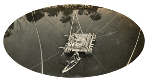 Bridge over the Nicholson River, Bairnsdale to Orbost line. A timber raft used as a work platform for sinking a bore to test sediment below the river bed of the Nicholson River, circa 1910