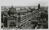 Flinders Street Station and the Yarra River, with Sandridge and Queens Bridges in the background, circa 1920