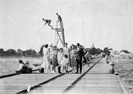Rail tracks and people on Queenscliff Pier, circa 1925