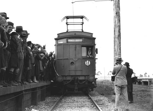 First electric train from Thomastown, swing door dog box