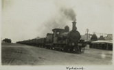 Goods train passing through Wycheproof, circa 1930. Steam engine is no. R 285.