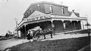 Two women with a horse and cart outside J. Wilson's Railway Hotel & Store, Yendon, circa 1925