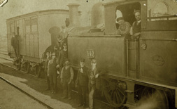 Loco crew with passengers and staff, circa 1910