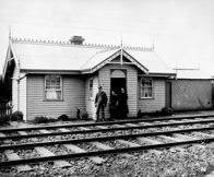 Gatekeeper family at cottage, circa 1890