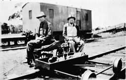 Two railway gangers on a trolley, Ingliston Railway Station, 1939