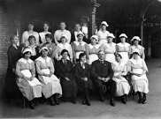 A group of 21 refreshment room staff pose on the platform at Bendigo Railway Station where Mondays were a very busy morning with passenger trains arriving from Echuca, Swan Hill, Heathcote, Cohuna, Robinvale and Kulwin, circa 1929