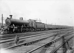 N class steam locomotive no. 121 hauling a coal train, Melbourne rail yard