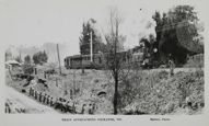 Steam engine with passenger carriages attached approaching Cockatoo Railway Station, pre-4 June 1935
