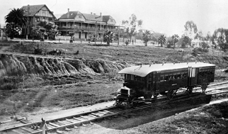 Motor rail travelling past the Grand Hotel, Mildura, circa 1930