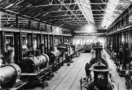 Newport Railway Workshops interior, with O, D, E and M class steam locomotives in the workshop, circa 1890