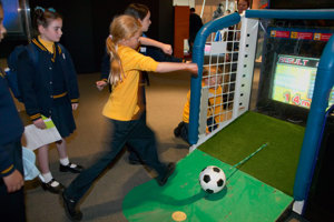 Girl kicking a ball in the Sportsworks exhibition