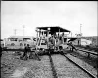 Electromatic track tamper machine being turned