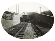 Tunnel construction on the South Kensington to West Footscray line, Footscray, 1928. A ballast train is about to enter the tunnel.