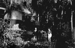 A timber train taking on water, Gembrook, circa 1938