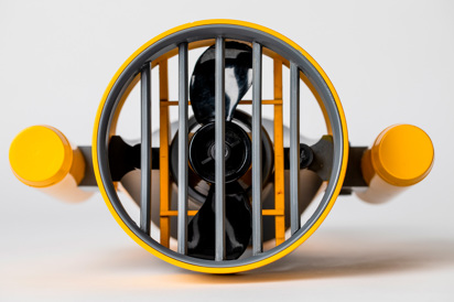 A view of a propellor from the underside. Two yellow handles sit either side of the propellor 