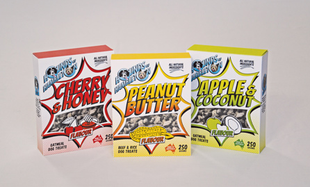 Three boxes of dog biscuits, flvoured cherry & honey, peanut butter, and apple & coconut 