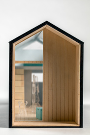 Front interior view of an architectural model of a compact, modern house