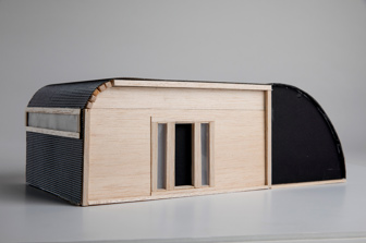 3D model of the modular housing structure. Model is made from wood, card and transparent paper