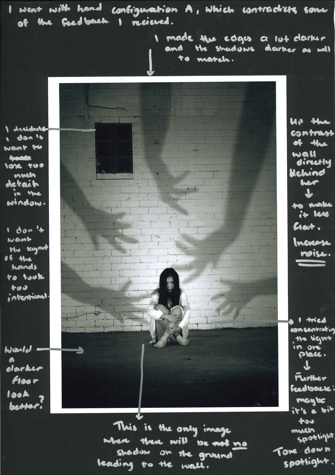 A page from a student design folio that shows a black and white photograph of a girl sitting on the ground in front of a white brick wall with shadows of hands reaching out all about her with hand written annotations about the production  