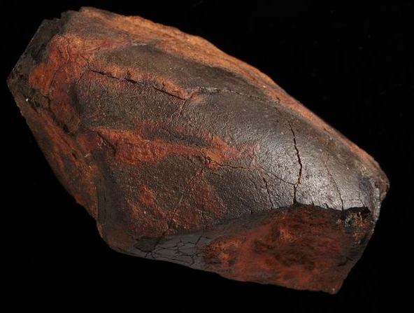 A reddish rock.