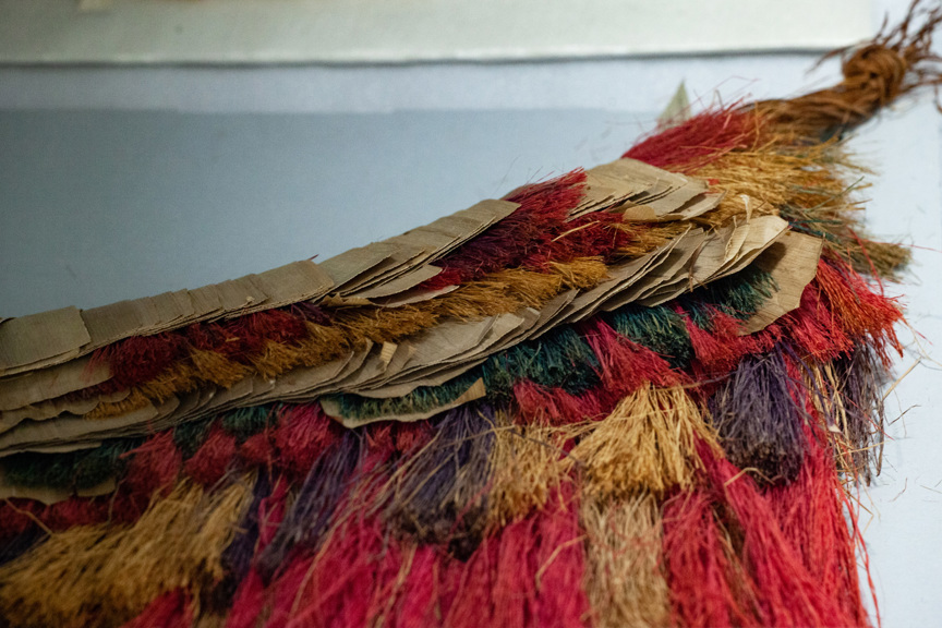 Detail of a colourful skirt made of natural fibres