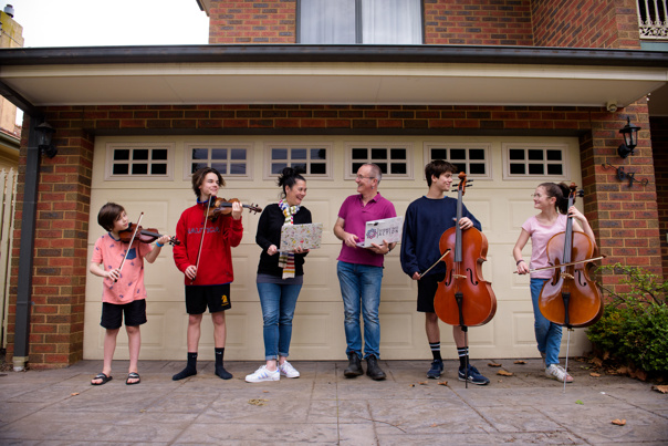 People standing in a line with musical instruments