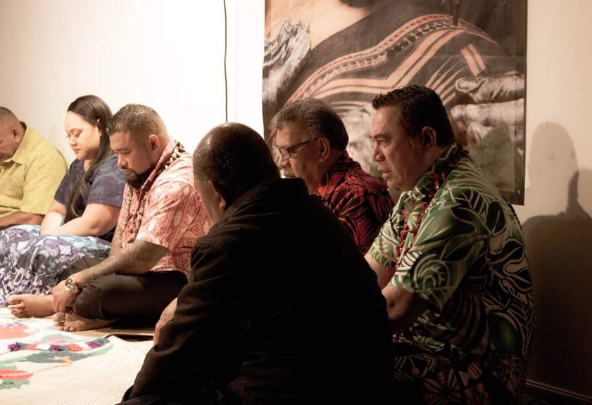 Group of people sitting in a circle