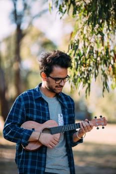 Man playing a ukelele