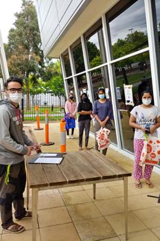 Man and students at a university