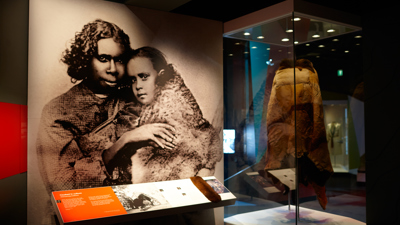 Possum skin cloak displays in 'Our Story' section of First Peoples exhibition