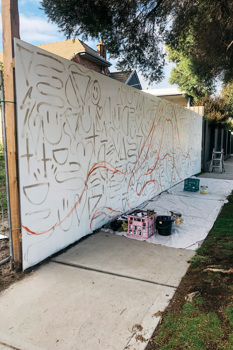 Fence paint white with small brown motifs