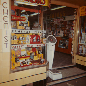Window display featuring Kodak camera outfits. 
