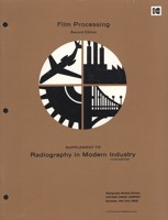 Booklet with a brown with a circular graphic on the cover divided into four quarters, each with a different graphic representation of an industry eg. an aeroplane and a factory.