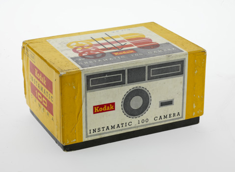 Yellow camera box with a graphic illustration of the camera on the box