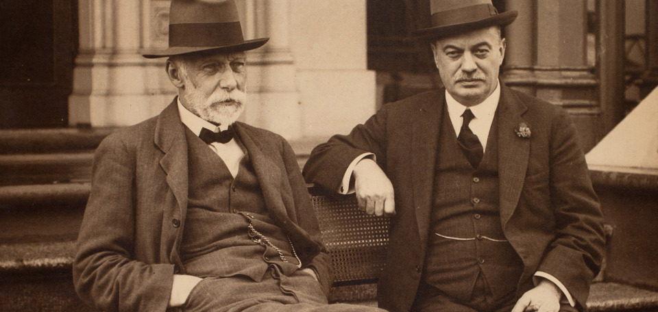 Two man sitting on a bench