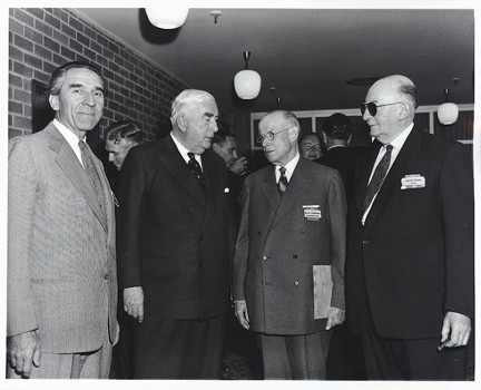 Group portrait of four men