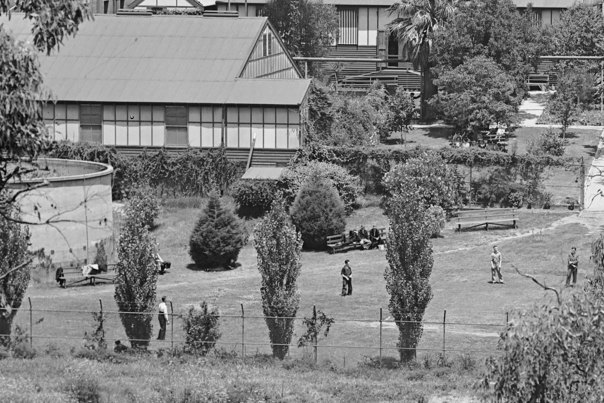 Group of people in the distance playing a gall game