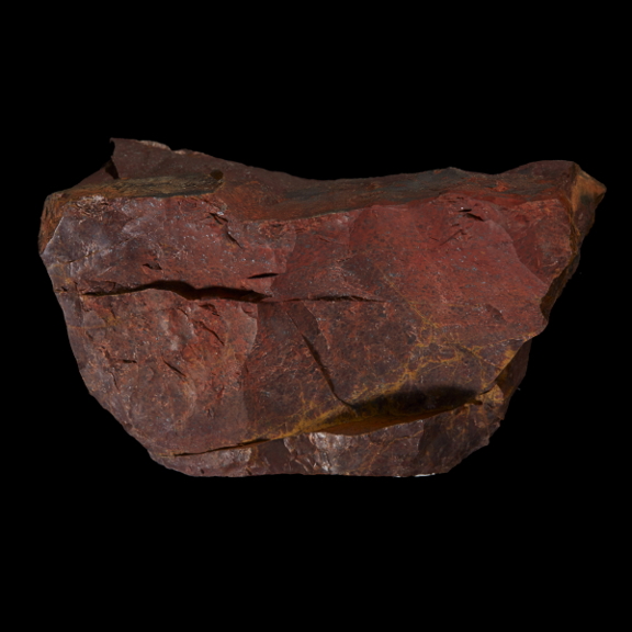 Red rock on a black background
