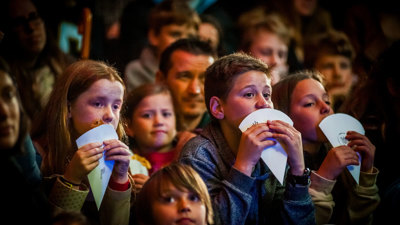 A crowd watching a show