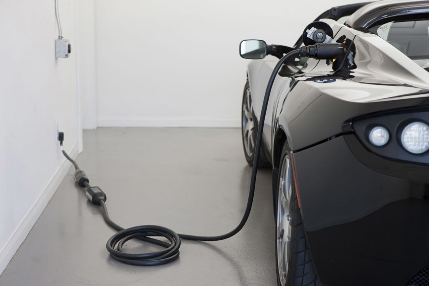 a car plugged into a wall charger