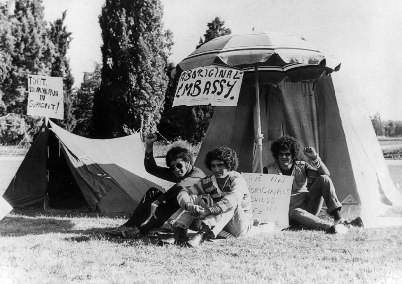 Aboriginal Tent Embassy, seated Mike Anderson, Billie Craig and Kevin Johnson, 27 January 1972. 