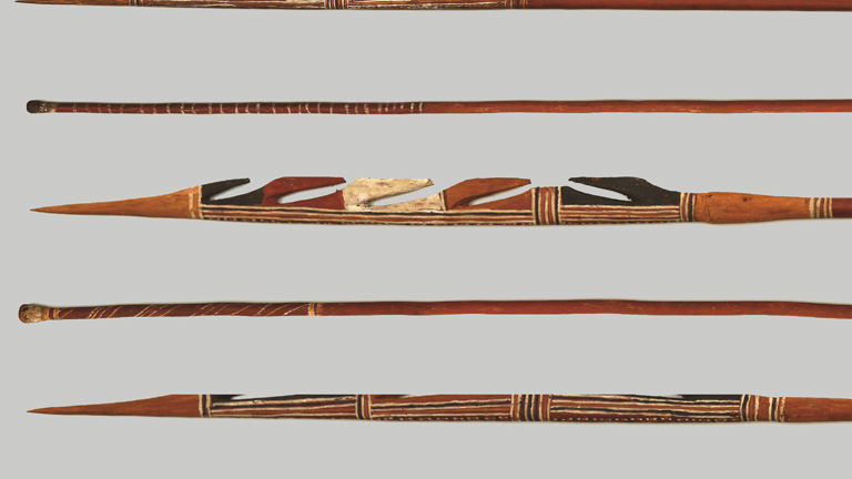 Detail of spears on grey background