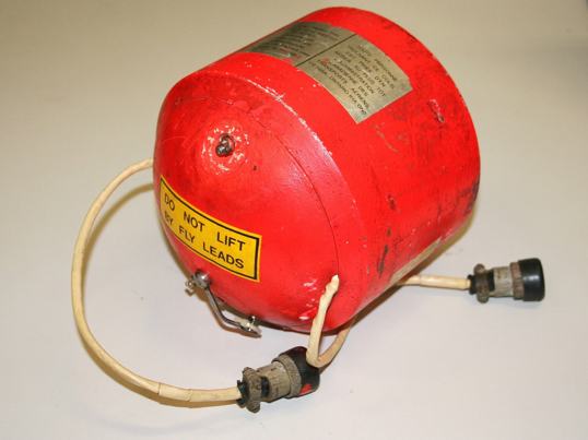 Red cylinder with tubes attached