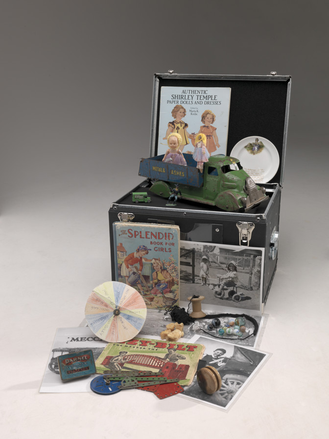 Various objects and props relating to childhood games used in reminiscing kit outreach programs