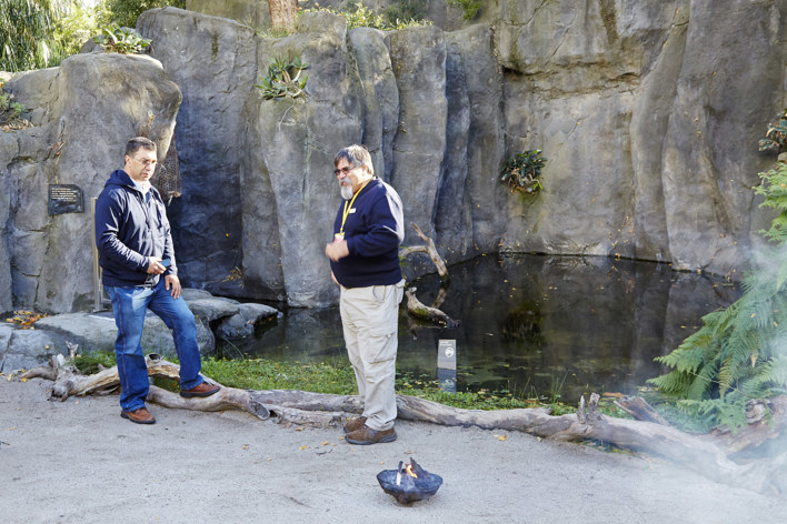 Two men standing beside Milarri Pond